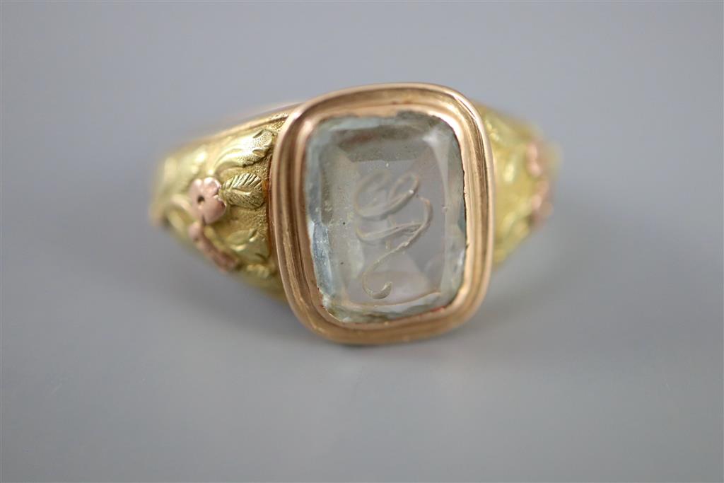 A William IV two colour gold and JA monogrammed aquamarine set ring,